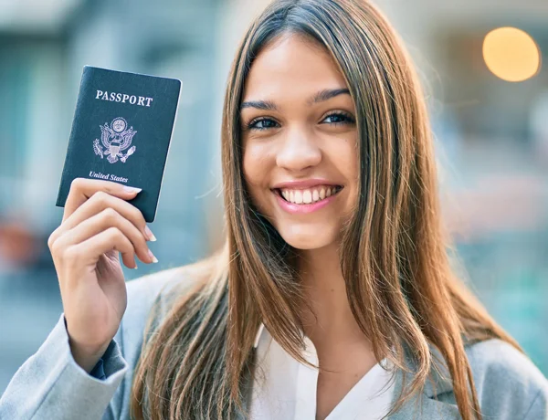 women girl lady holding a passport